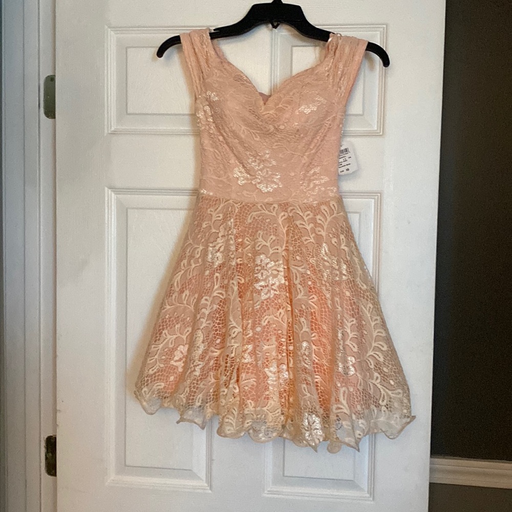 Cocktail dress, extra small peach in color